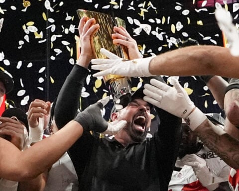 Ohio State wins 1st national title since 2014, outlasting Notre Dame 34-23 in CFP championship game