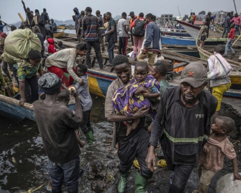 A rebel group is advancing on eastern Congo's largest city and over 100,000 people have fled