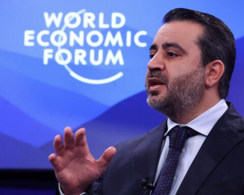 Davos-Syria's economy will be open for foreign investment, foreign minister says