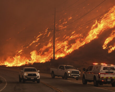 Over 50,000 under evacuation orders or warnings as wildfire imperils homes north of Los Angeles