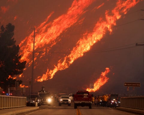 New wildfire near Los Angeles explodes to 9,400 acres, forces evacuations