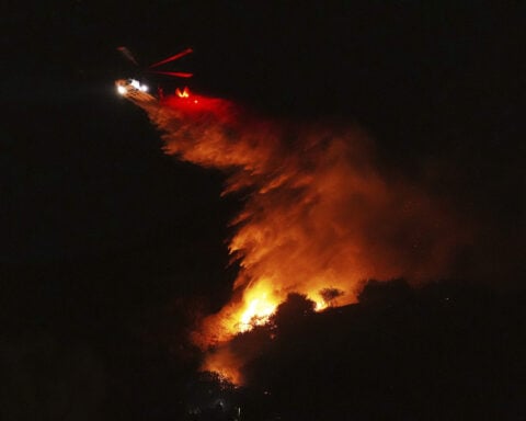 Firefighters battle to maintain the upper hand on a huge fire north of Los Angeles