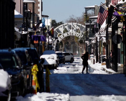 Much of US South coated in ice after historic winter storm