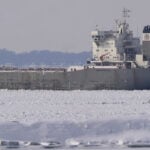 A Canadian freighter gets trapped in ice on Lake Erie