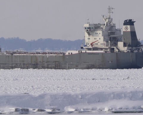 A Canadian freighter gets trapped in ice on Lake Erie