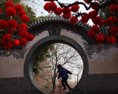 China readies for Lunar New Year, amid worries about the economy