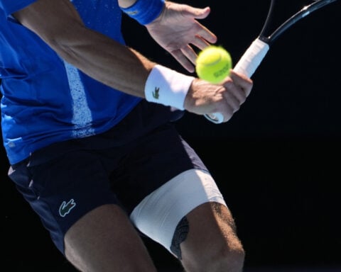 Injured Djokovic quits mid-match and walks off to boos, putting Zverev in the Australian Open final