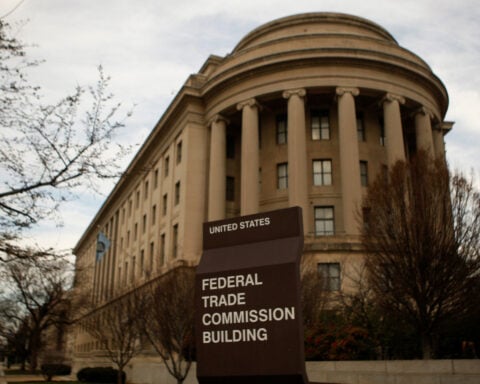 FTC chairman says COVID is long over, get back to the office