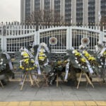 South Koreans turn funeral wreaths and K-pop light sticks into political protest tools