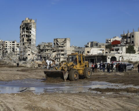 Israeli fire kills 1, wounds 7 as Palestinians are kept out of north Gaza over a ceasefire dispute