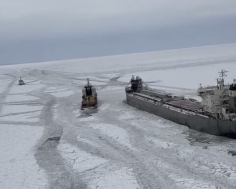 Freighter on the move after it was freed from ice on frozen Lake Erie