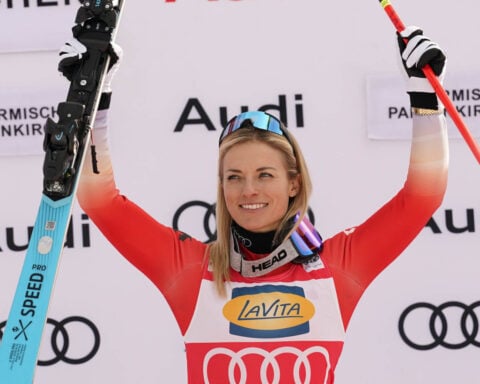 Swiss skier Lara Gut-Behrami gets 1st World Cup win of season. Lindsey Vonn finishes 13th