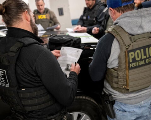 Federal agents in immigration operations told to be camera-ready as hundreds arrested