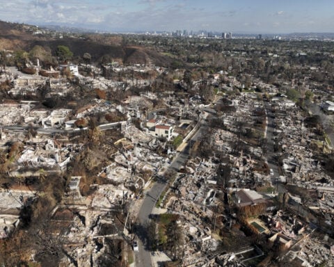 Rain douses wildfires in Southern California without causing serious mudslides