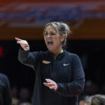 Lady Vols coach Kim Caldwell returns 1 week after giving birth to son