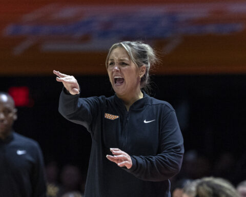 Lady Vols coach Kim Caldwell returns 1 week after giving birth to son