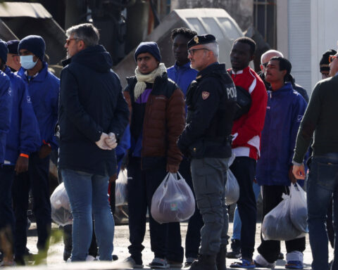 Italian ship carrying migrants picked up offshore reaches Albania