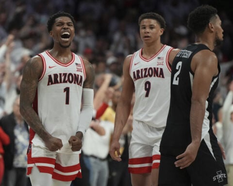 Big-time Love: Arizona's Caleb Love hits half-court heave at buzzer in OT win over No. 3 Iowa State