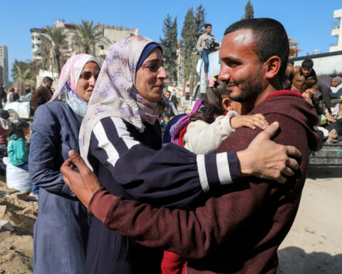 Palestinians return to Gaza City as mediators look ahead to next stage