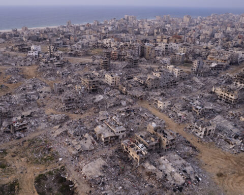 Middle East latest: Palestinians return to their homes in northern Gaza for a second day