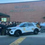 Students unveil custom patrol car design for their beloved resource officer