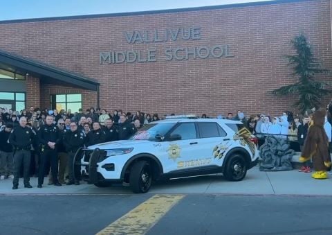 Students unveil custom patrol car design for their beloved resource officer