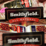 Pork giant Smithfield's CEO touts growth outlook, minimizes threats from deportations, bird flu