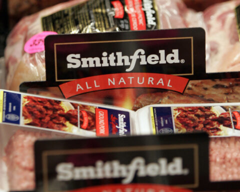 Pork giant Smithfield's CEO touts growth outlook, minimizes threats from deportations, bird flu