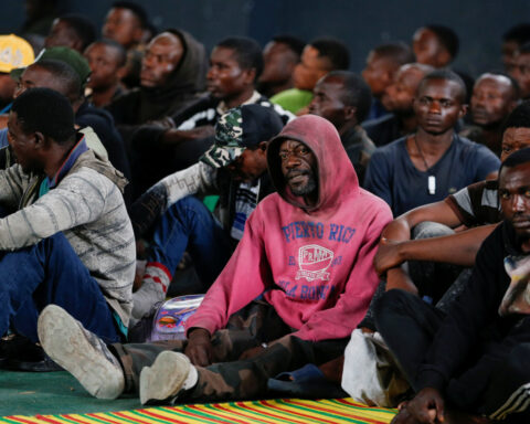 Refugees and surrendering Congolese soldiers stream into Rwanda