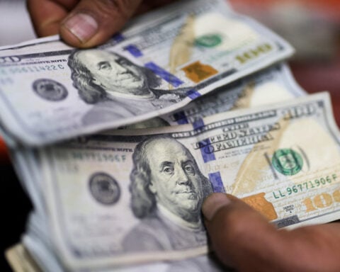 US dollar firms against peers after Fed holds rates steady