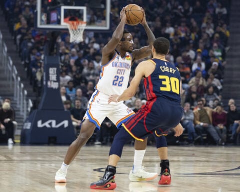Gilgeous-Alexander scores 52 but Curry and Wiggins lead balanced Warriors past Thunder 116-109