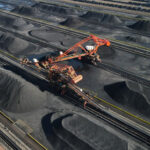 Column-China's iron ore and coal imports ease in January, but prices diverge: Russell