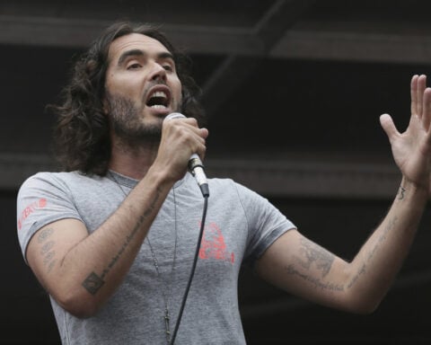 BBC apologizes to staff who felt they were unable to raise concerns about comedian Russell Brand