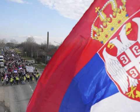 Serbia's striking students set off on 2-day march north as their protest movement widens