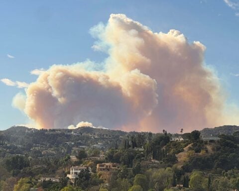 Fast-moving Pacific Palisades fire erupts amid strong winds