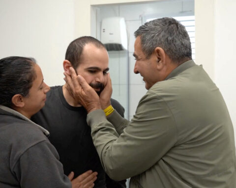 Israeli hostage's release brings some relief for family but fate of wife, children unknown