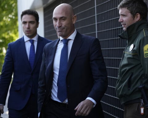 What to know as former Spain soccer official Rubiales goes on trial for unsolicited kiss of player
