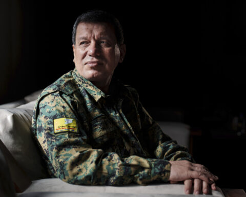 US-backed commander says his Kurdish-led group wants a secular and civil state in post-Assad Syria