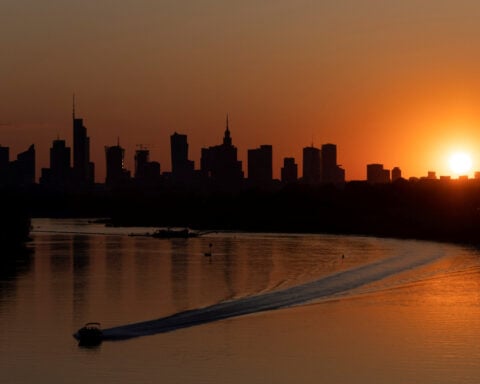 Poland needs to cut spending and raise taxes, OECD says