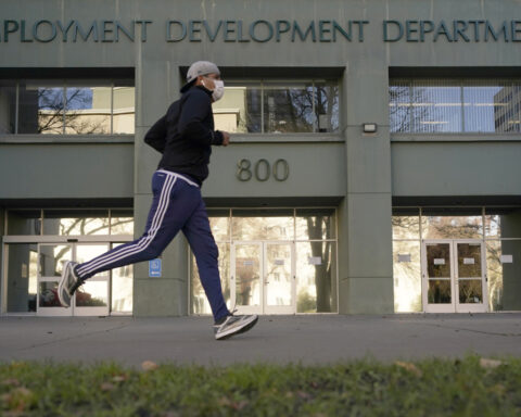 US job openings fall to 7.6 million in December, suggesting the job market is slowing but healthy