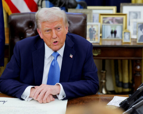Trump signs memo aiming to block Iran from achieving nuclear weapon