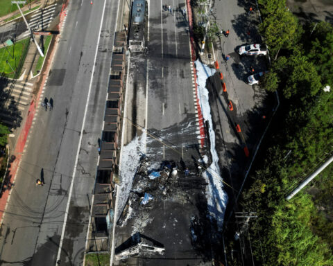 Two dead as small plane crashes into bus on busy Sao Paulo avenue