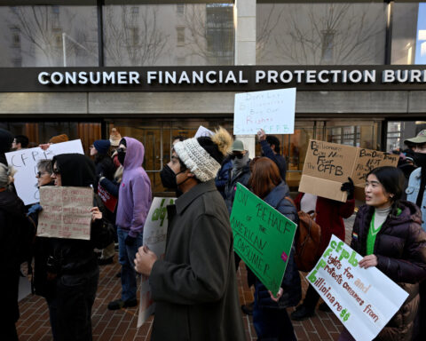 Protest erupts after US consumer watchdog boss tells staff to stop work