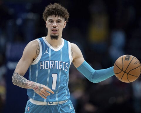 LaMelo Ball misses second half of Hornets' game against Brooklyn with right ankle soreness
