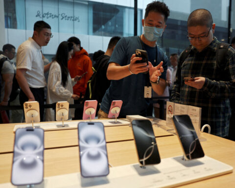 Apple teams up with Alibaba to bring AI features for iPhones in China, The Information reports