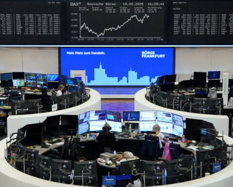 European shares end at record high; steelmakers, miners drop on tariff woes
