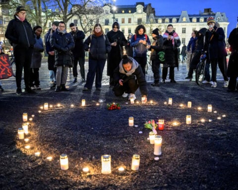 Sweden mourns victims of mass shooting and searches for answers