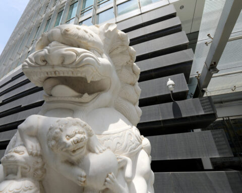 China's record mergers in $8 trillion small banking sector raise future risks