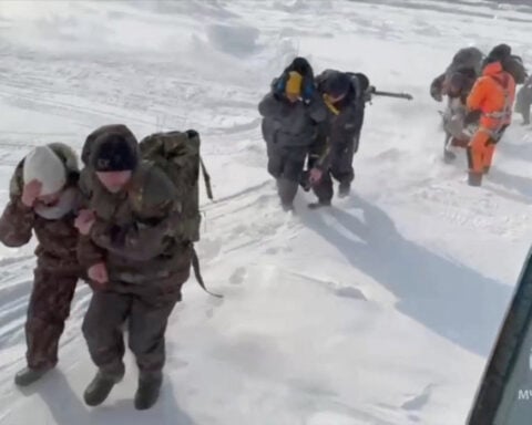 Russia says it rescues all 139 fishermen stranded on ice floe in Western Pacific sea