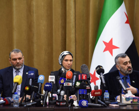 Syrian groups must disarm to take part in national dialogue, official says